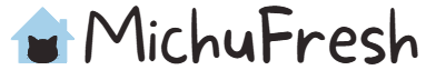 Logo de MichuFresh con ilustración de una casa azul y la cara de un gato negro.